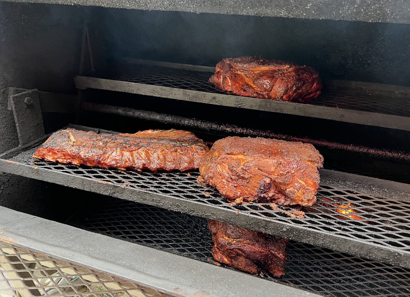 Ribs on the smoker racks.