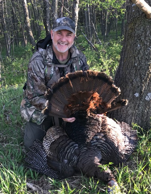 JB with a longbeard in the hardwoods.