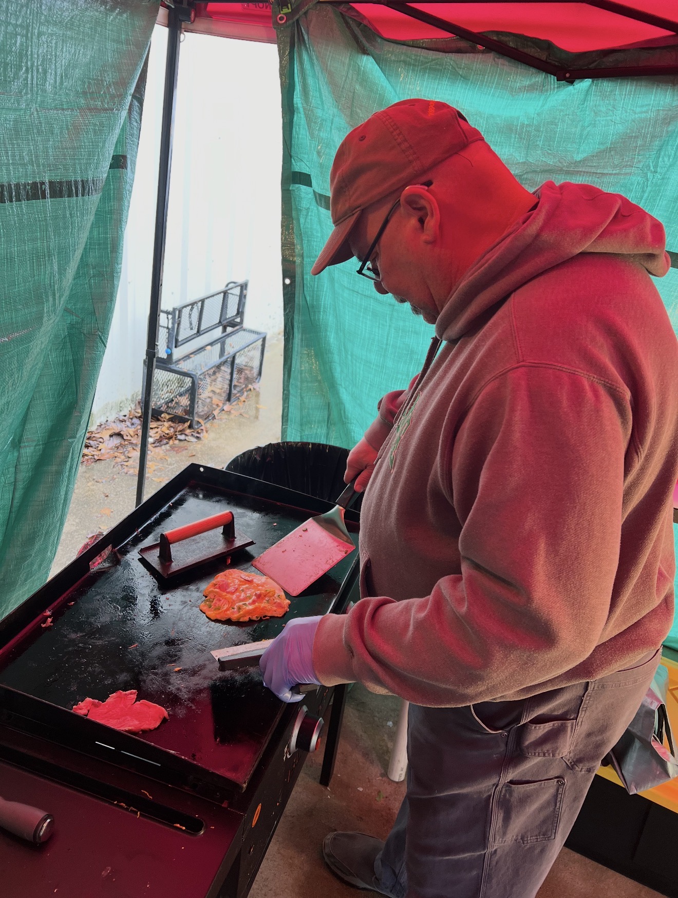Cooking on the griddle under the canopy.