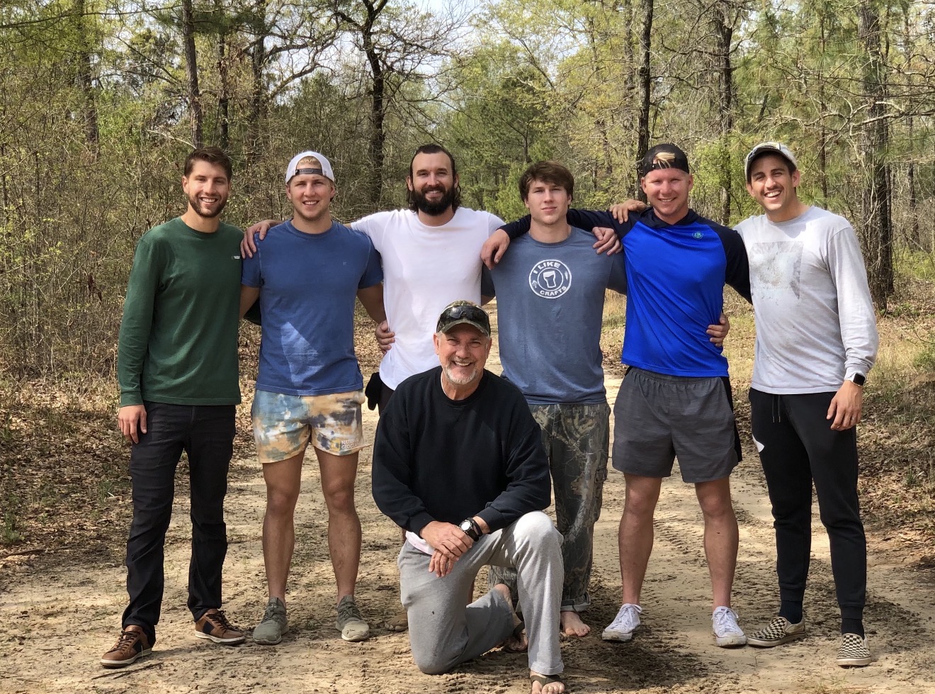 JB and a group of hunters on the ranch road.