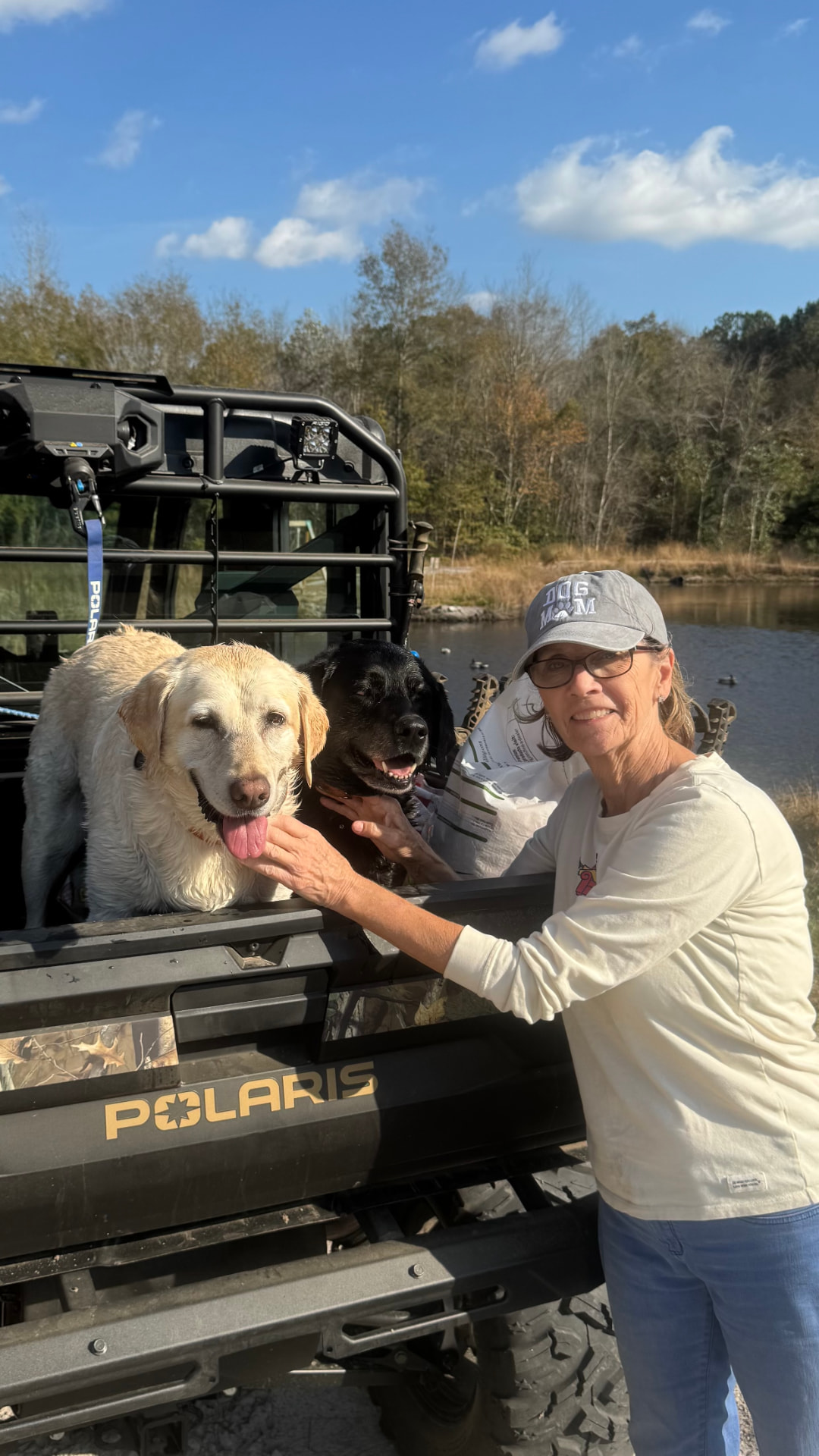 Riding down to the pond with the dogs.