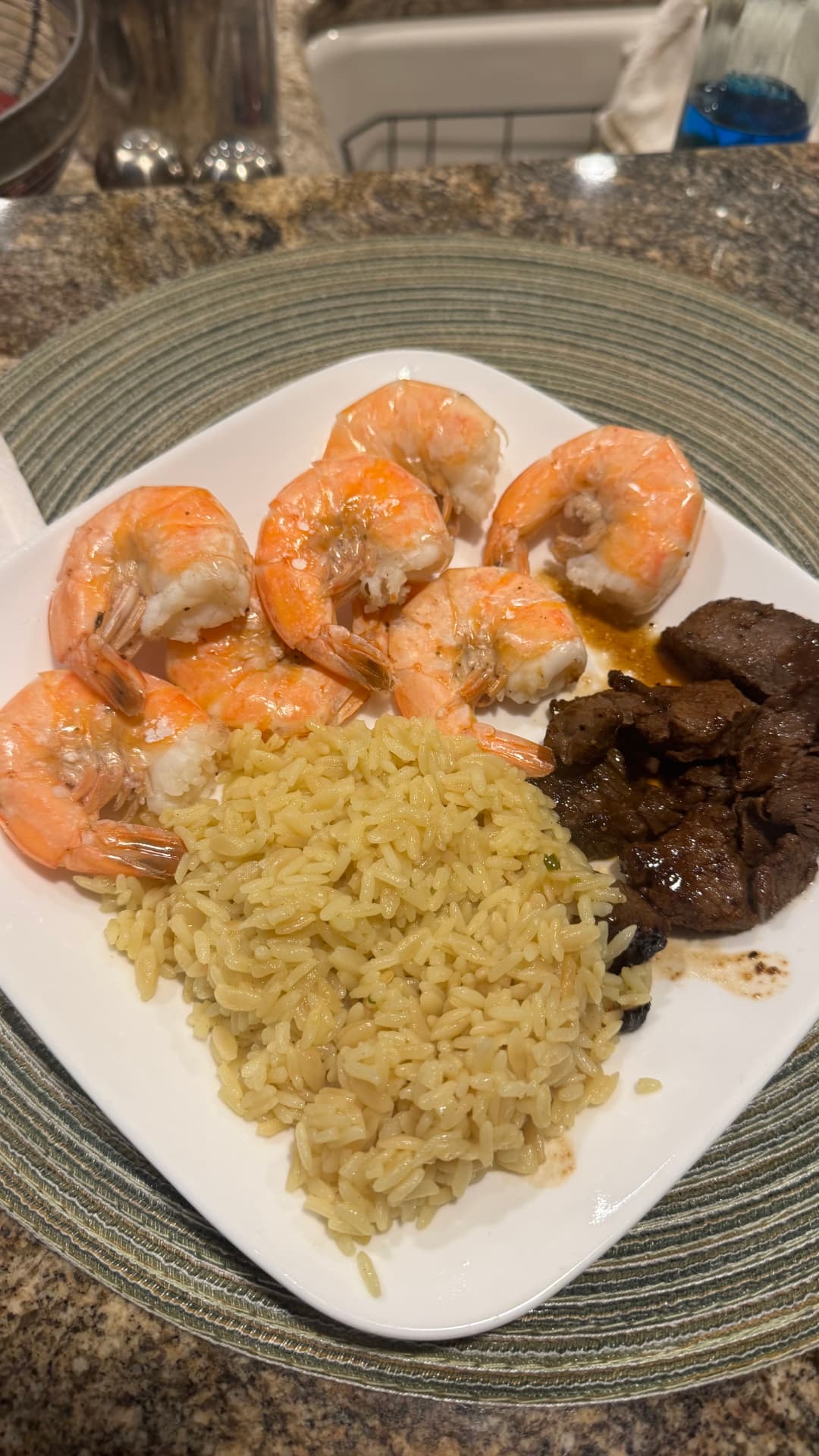 Plate of shrimp, rice and venison filets at the lodge.