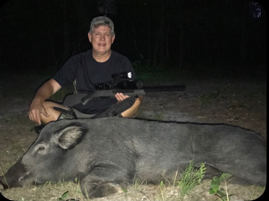 Steve with a monster Russian boar — 22-250 to the ear and it was all over in minutes.
