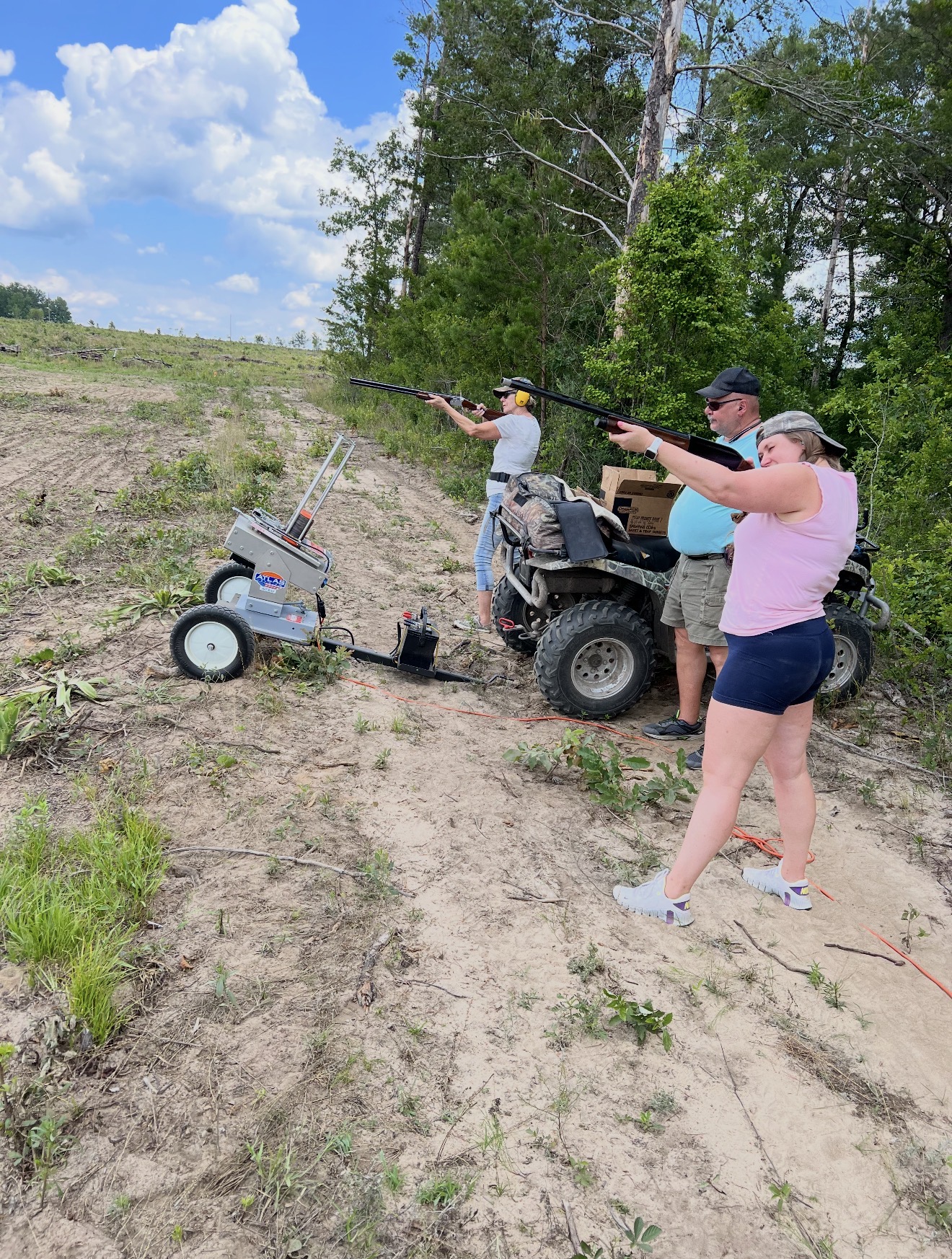 Taking turns shooting clays.