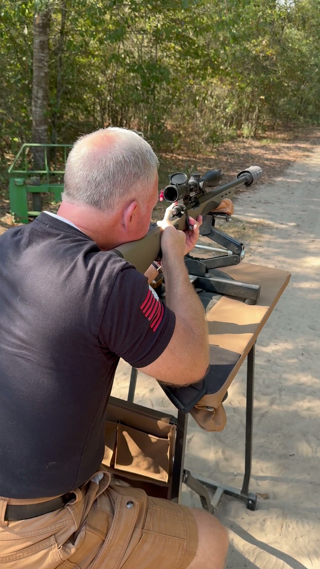 Shooting a suppressed .308 at the 125-yard steel range.