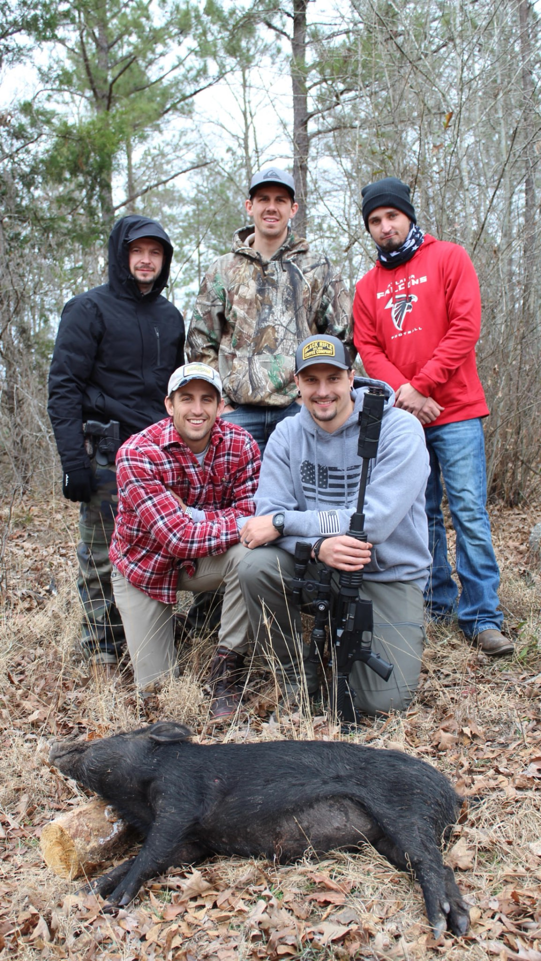 Hunters with a Russian black hog taken at the ranch