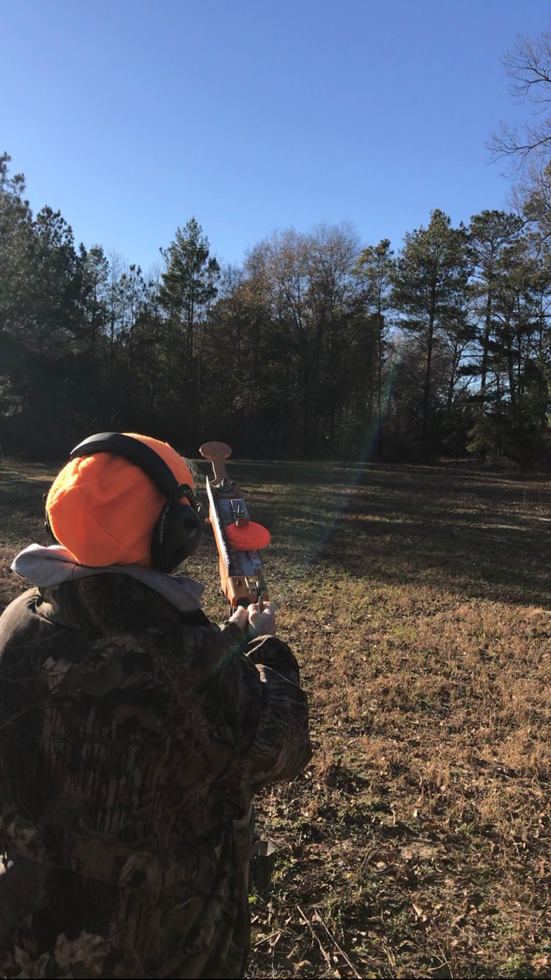 Young shooter on the clay range.